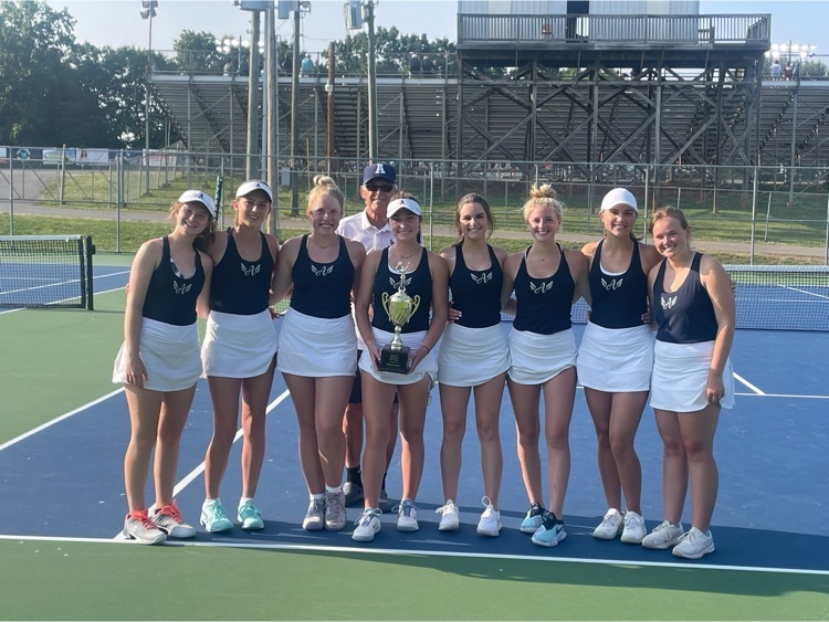 Girls tennis team picture with trophy