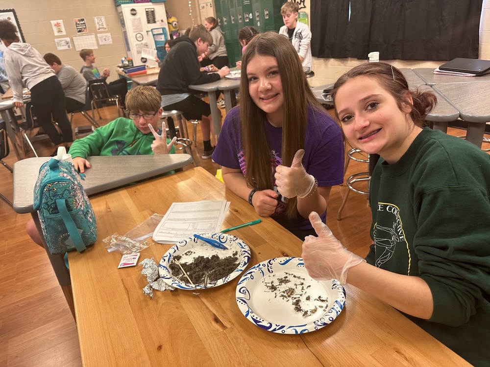 WMS Students dissecting an owl pellet